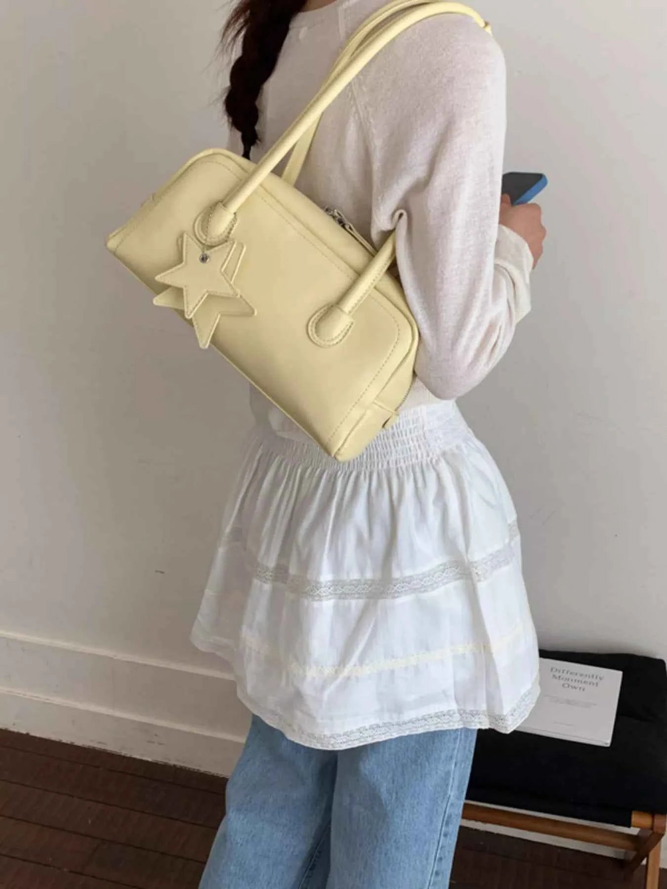 Pastel yellow handbag with star detail, stylish accessory for women's fashion outfits