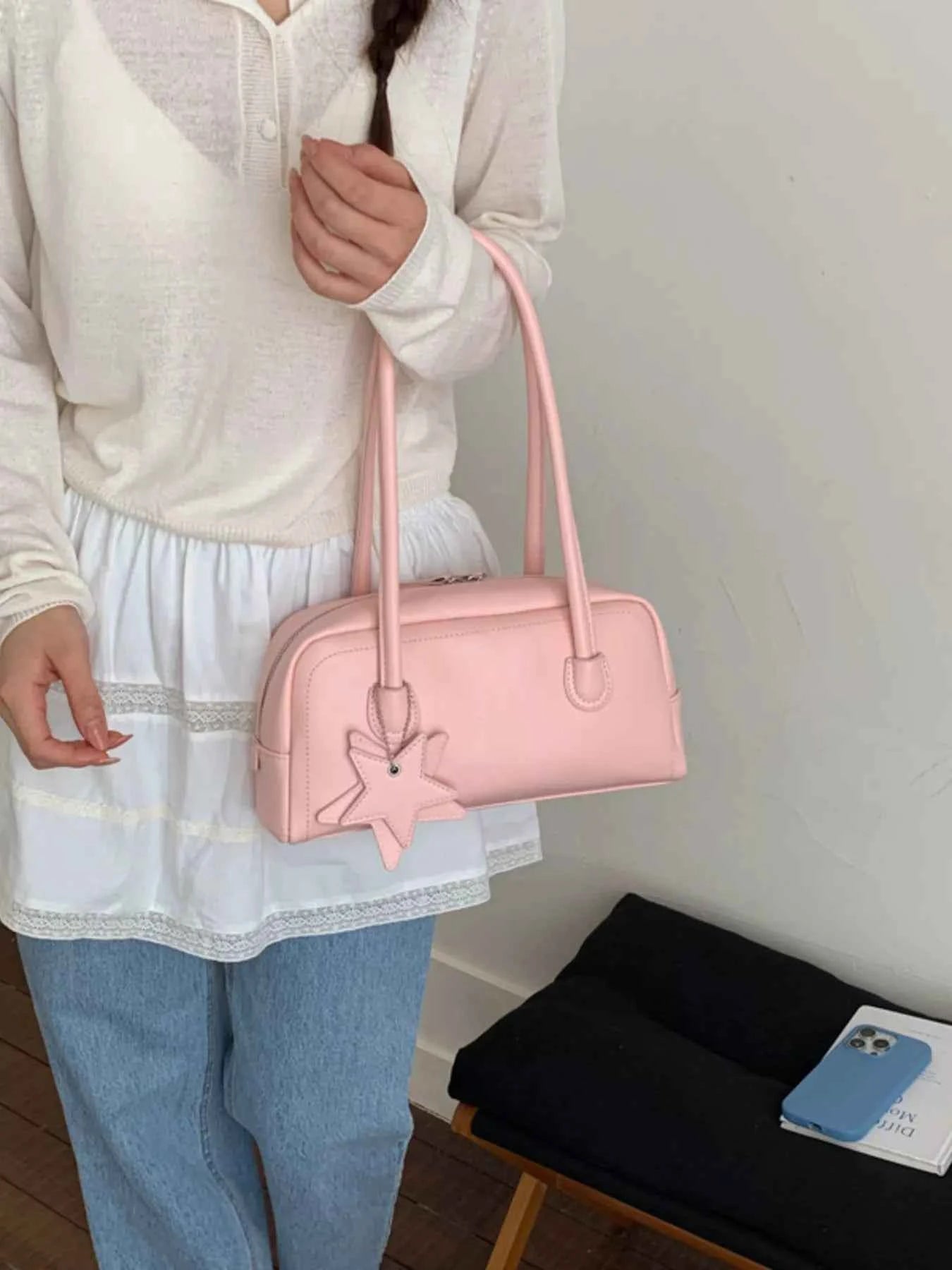 Pink star charm handbag, trendy fashion accessory for women, stylish shoulder bag with soft texture