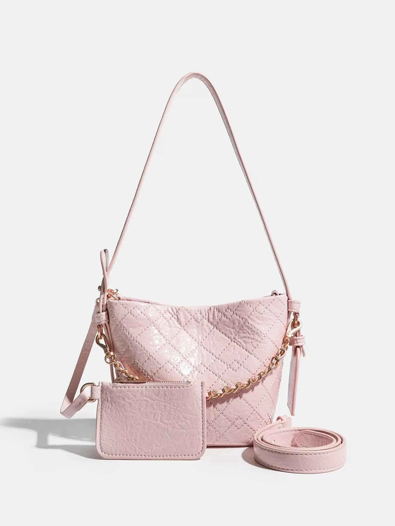 Pink quilted crossbody bag with gold chain strap and matching cardholder, trendy fashion accessory